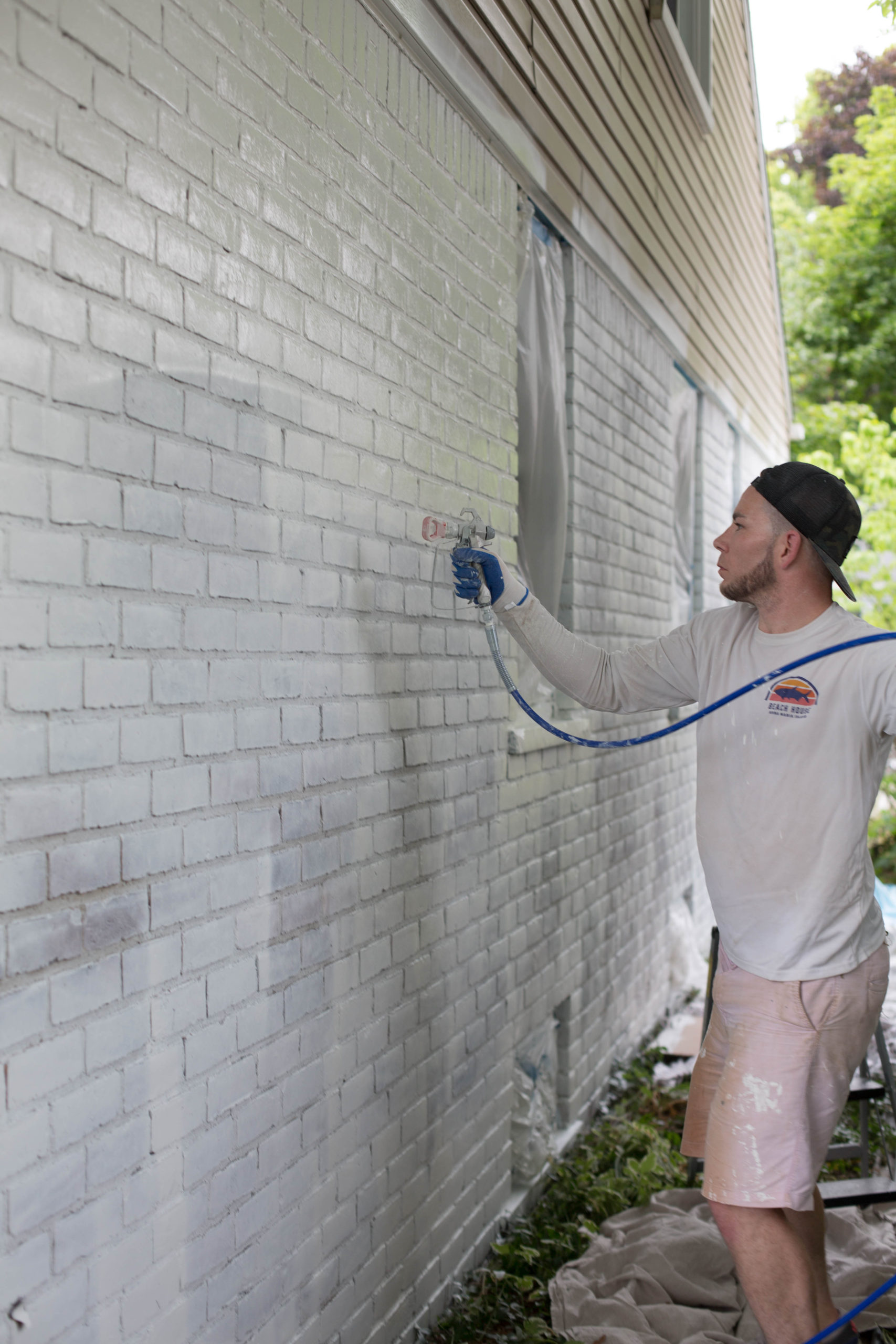 DIY how to paint brick and vinyl siding