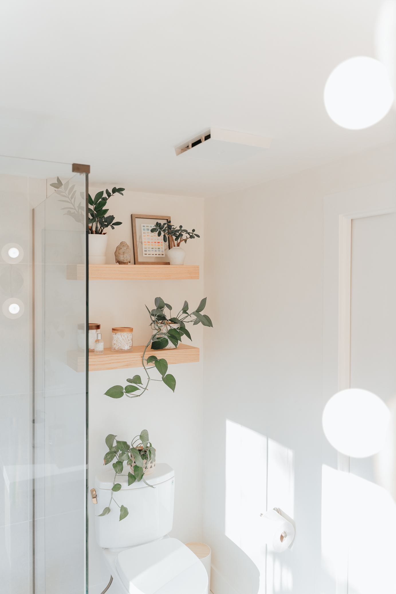 Image floating shelves in a small bathroom remodel