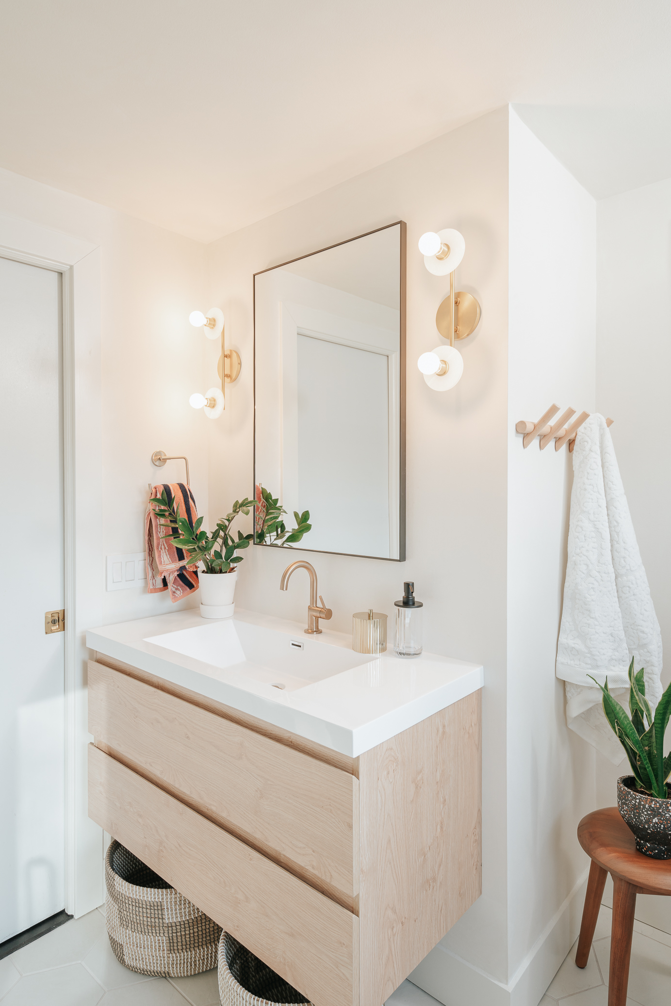 Image of a wall mounted vanity to optimize a small bathroom remodel