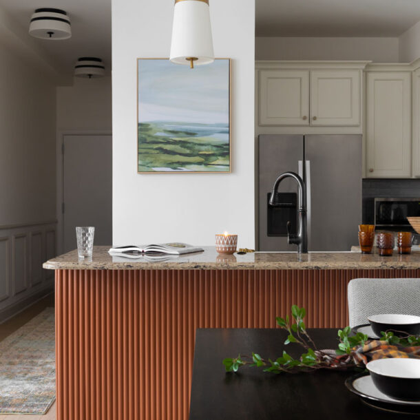 High-end kitchen renovation in Ann Arbor, MI, with modern pendant lighting, premium materials, and sleek design.