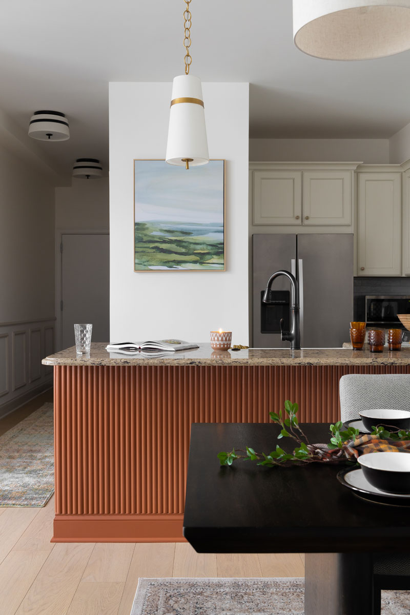 High-end kitchen renovation in Ann Arbor, MI, with modern pendant lighting, premium materials, and sleek design.