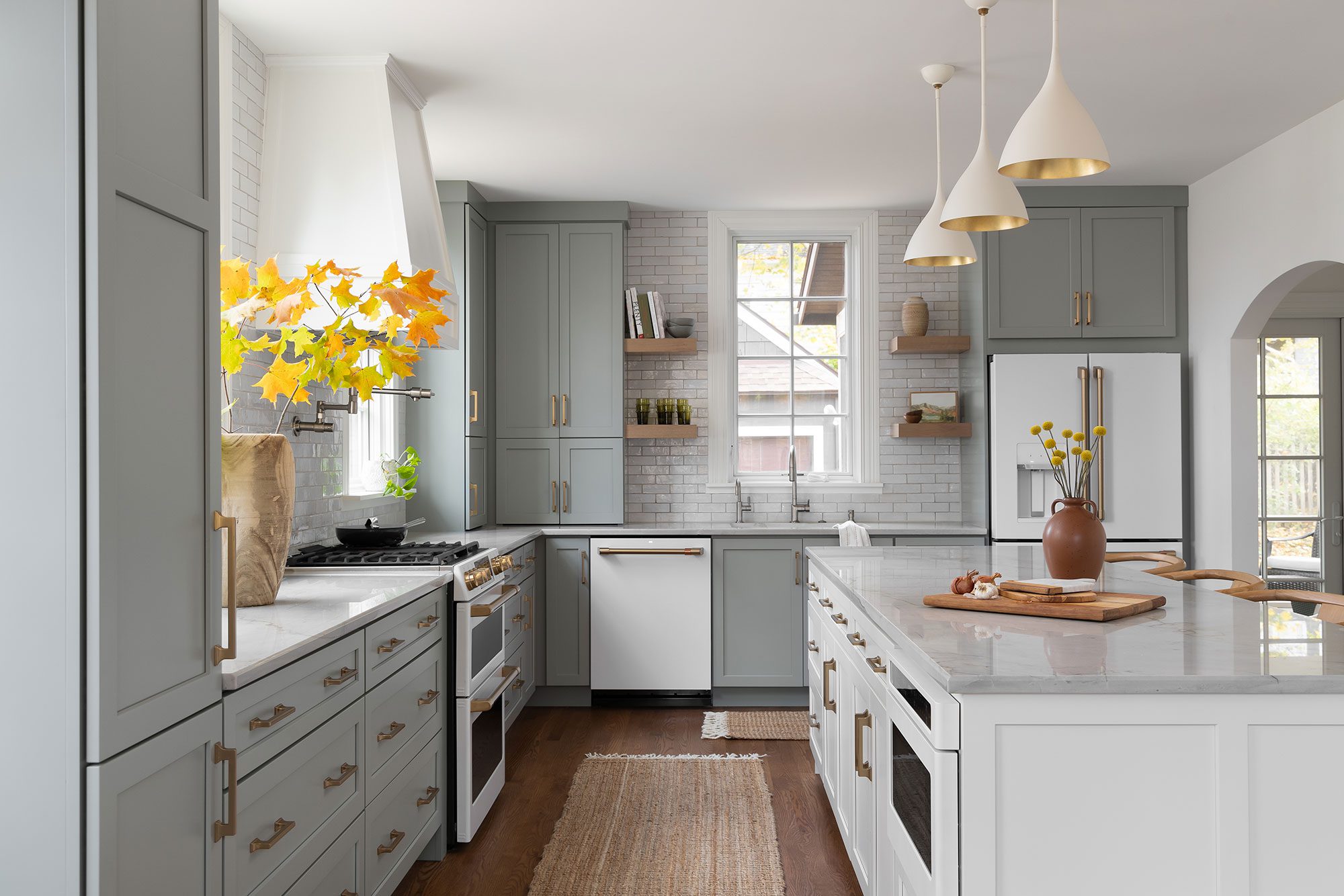 Modern kitchen remodel near me with sleek cabinetry, built-in appliances, and a minimalist design by Clark + Aldine.