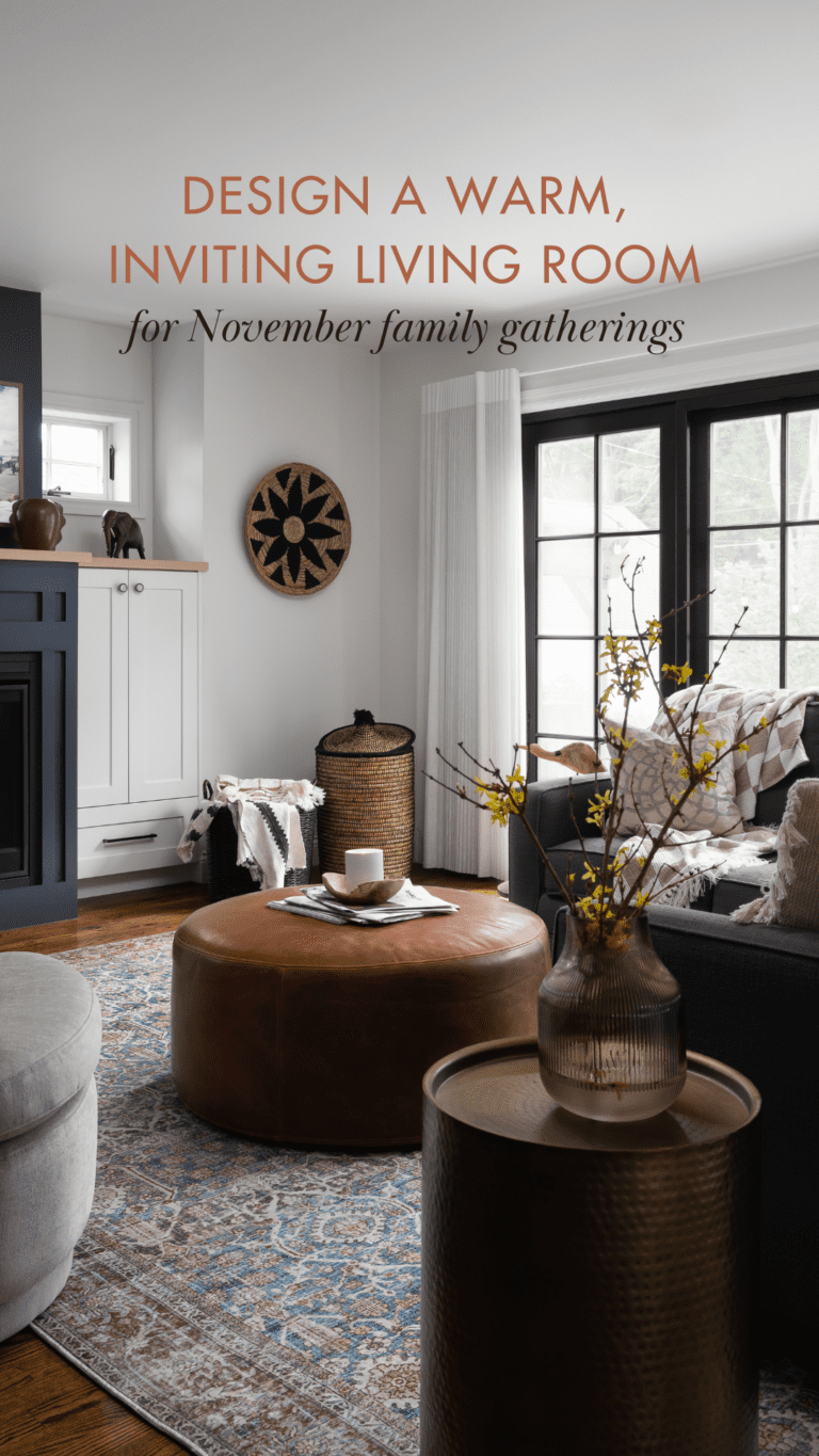 A warm, inviting living room with natural textures and cozy seating, perfect for November family gatherings. Features a leather ottoman, patterned area rug, and nature-inspired decor.